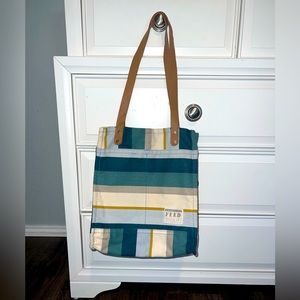 Flaunt your eco-friendliness in style with this functional multi pocket tote.